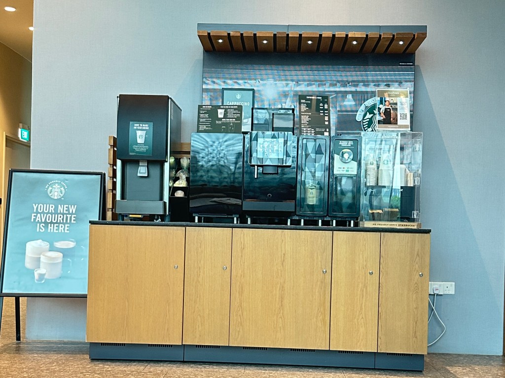 Self-serve Starbucks coffee machine and beverage station at Citadines Rochor Singapore