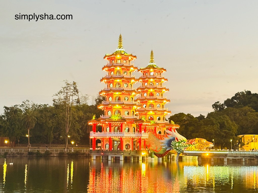 Dragon and tiger pagodas by the pond