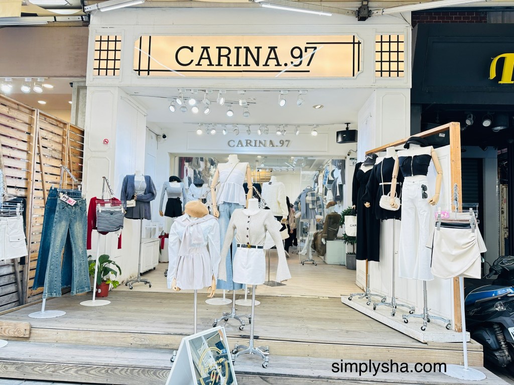 White women store with various clothes on display