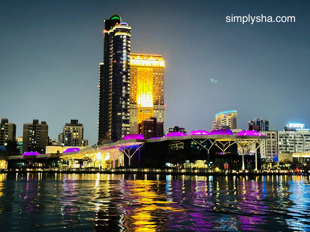 Harbor view with buildings at night