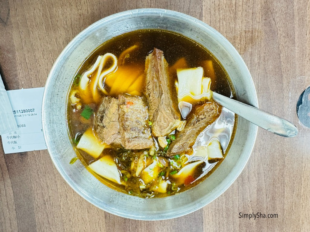 Bowl of Lao Shan Dong beef noodles with tender beef and clear broth