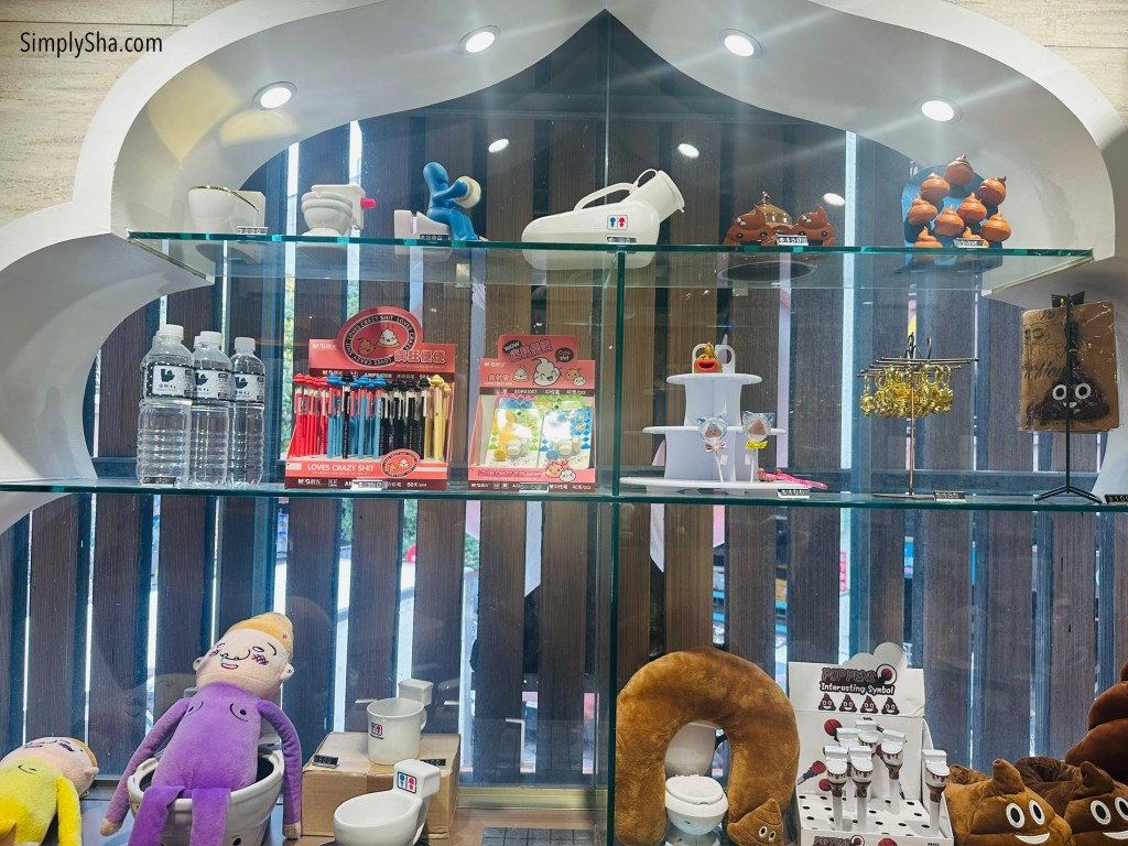 Toilet-themed merchandise display inside Modern Toilet restaurant in Ximending