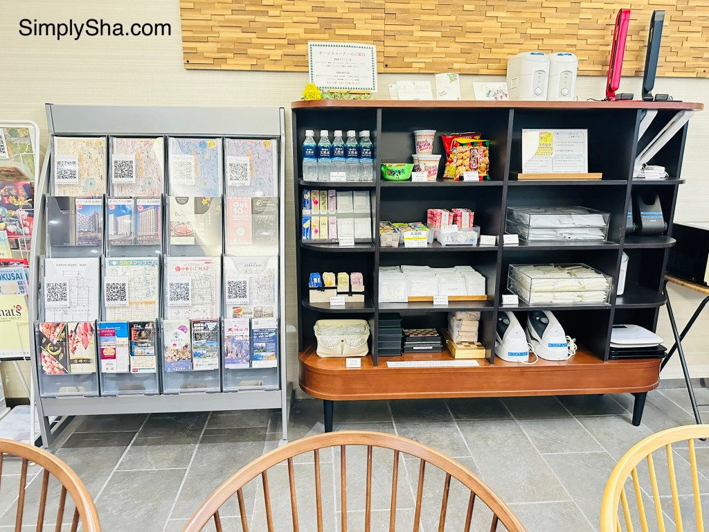 Hotel lobby amenities and travel brochures at Hotel Kuretakeso Takayama Ekimae