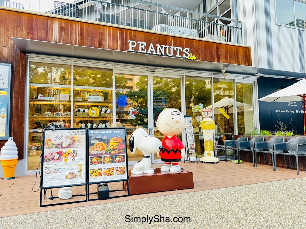 Peanuts Cafe exterior with Snoopy statue at Hisaya Odori Park in Nagoya