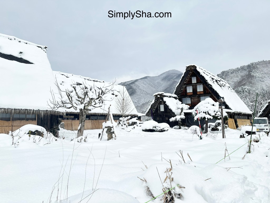 snow-covered gassho-zukuri house in Shirakawa-go village during winter