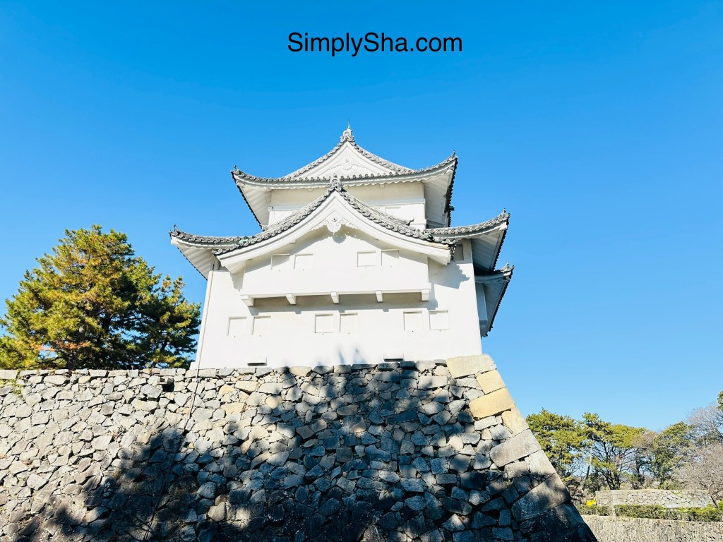 Nagoya Castle turret standing on a historic stone wall in Nagoya, Japan