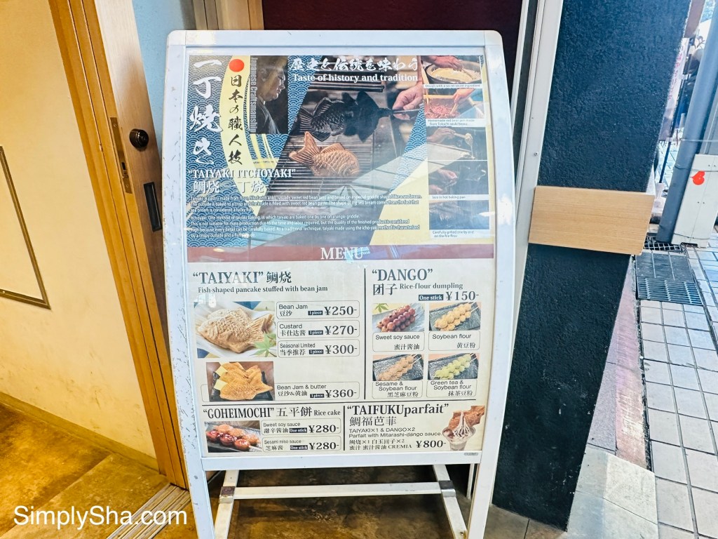 Taiyaki menu displayed outside a shop on Osu Shopping Street in Nagoya