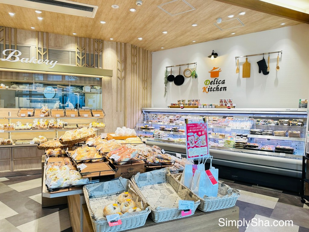 Fresh bread and pastries displayed inside a bakery in Nagoya, Japan