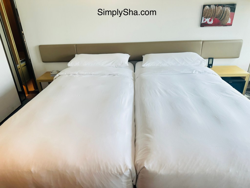Comfortable twin beds at Hotel Stage in Jordan, Hong Kong